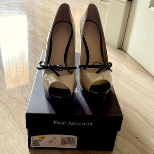 Enzo Angiolini patent leather nude heels with sweet black bow detail